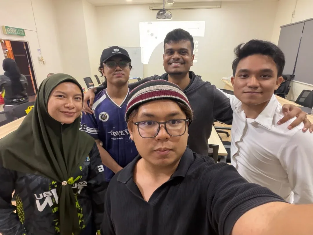 The OrynLab team and their host taking a selfie after the session